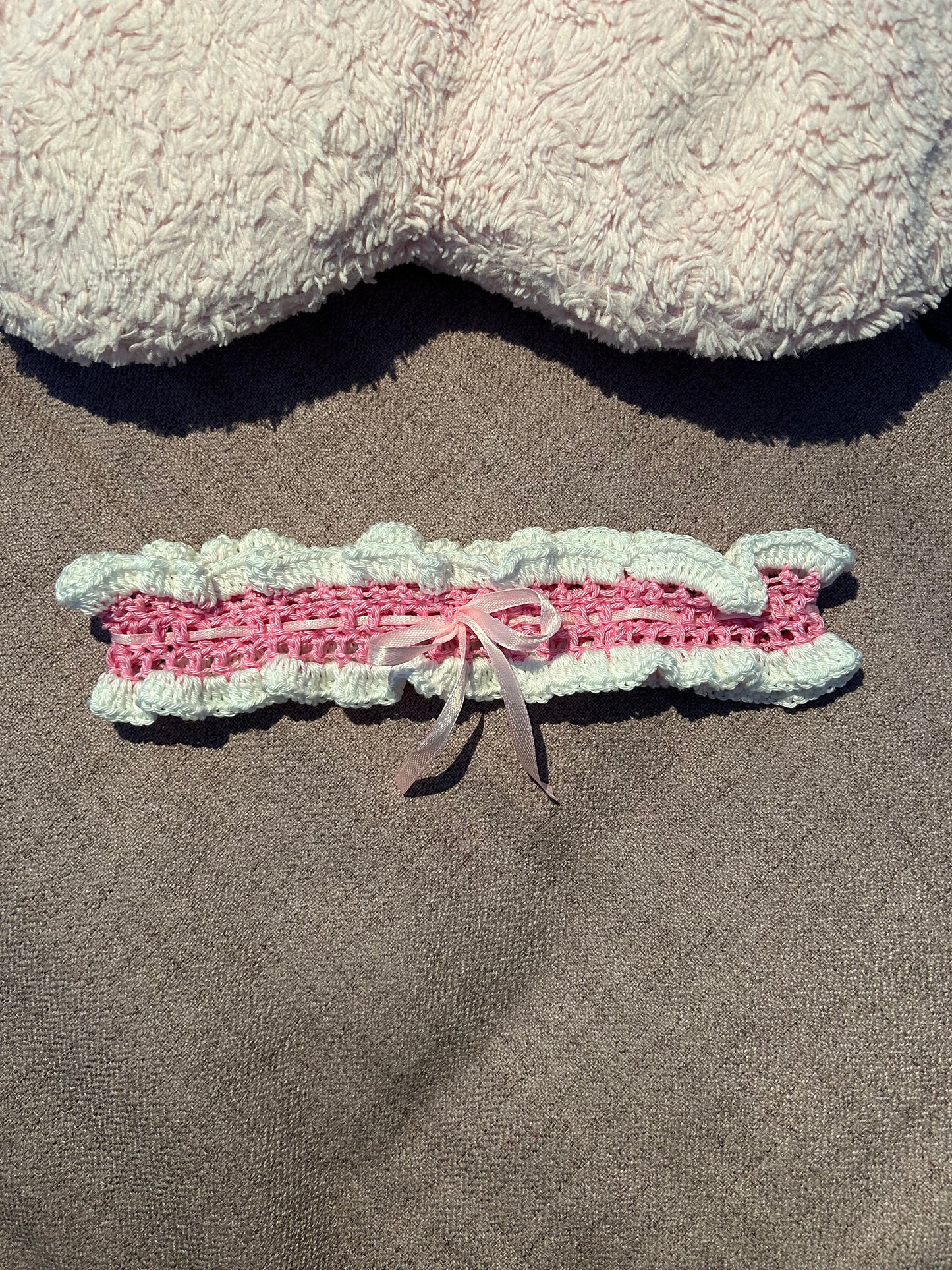 ..Frilly crochet garter with satin bow